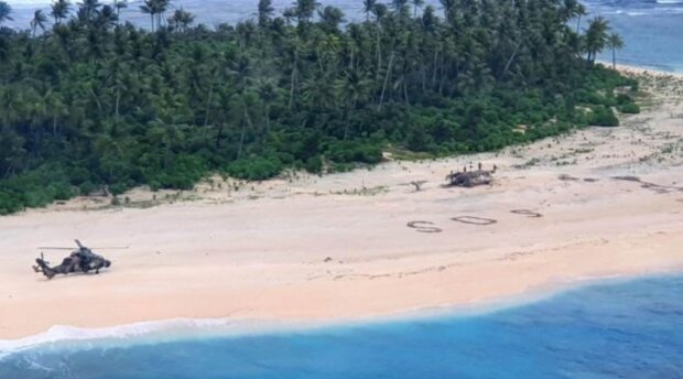 Die SOS-Inschrift auf dem Sand rettete Menschen, die auf einer Insel im Pazifischen Ozean festsaßen