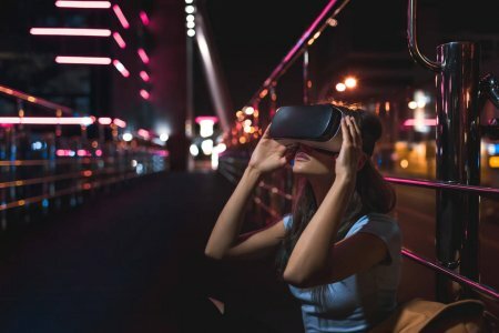 depositphotos_207683940-stock-photo-young-woman-virtual-reality-headset