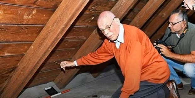 Mann zog einen unauffälligen Strick auf dem Dachboden und fand ein Versteck, dass man dort vor 70 Jahren verließ