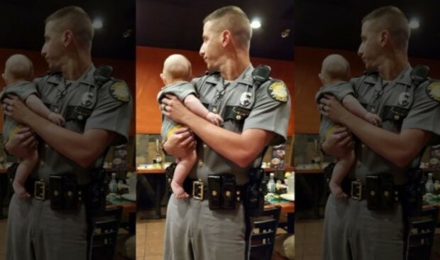 In einem Café nahm ein Polizist ein Baby auf den Arm, damit seine Mutter essen konnte